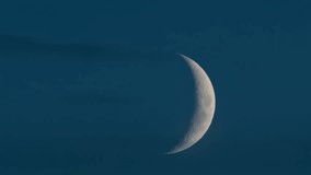 Close up of crescent moon illuminated against a deep blue sky - Powered by Shutterstock - Get 15% off with code: PIKWIZARD15
