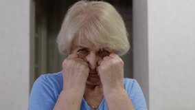 Senior woman powerfully performing boxing punches, demonstrating physical strength, fitness commitment, and resilient approach to healthy aging through dynamic exercise routine - Powered by Shutterstock - Get 15% off with code: PIKWIZARD15