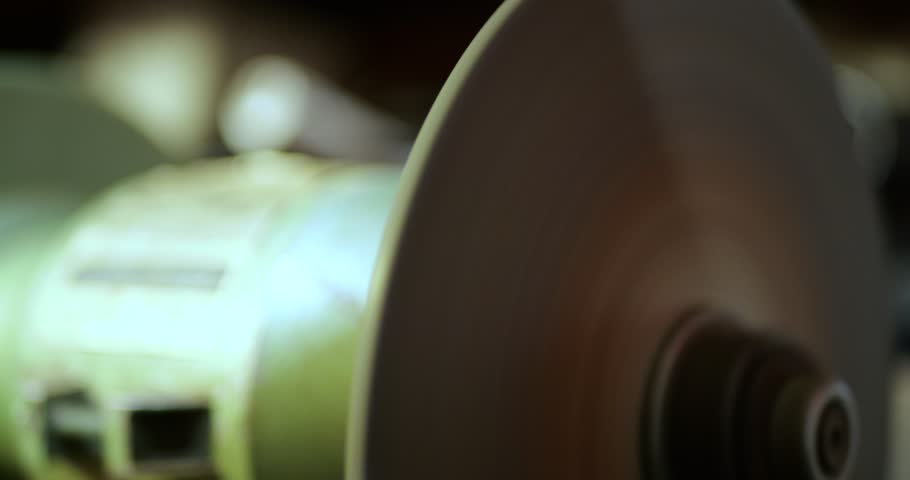 Grinding Machine High RPM Touching Metal Bolts, Bright Sparks Erupting from Friction with Sound, Industrial Workshop Power Tool Operation, Manufacturing Metal Fabrication Process