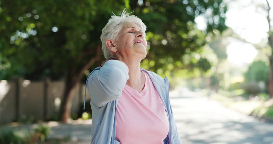 Road, senior woman and stretching arms for mobility, workout preparation and wellness in getting ready. Retirement, health and old person outdoor with warm up exercise, fitness or stiff muscle relief