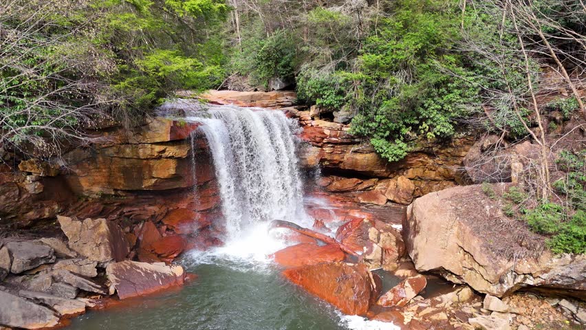 Douglas Falls cascading over red sandstone into North Fork Blackwater River in Thomas, West Virginia, USA