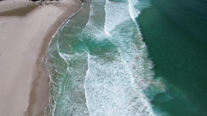 Foamy Waves Splashing At Little Beach Cove In Tasmania, Australia - Drone Shot