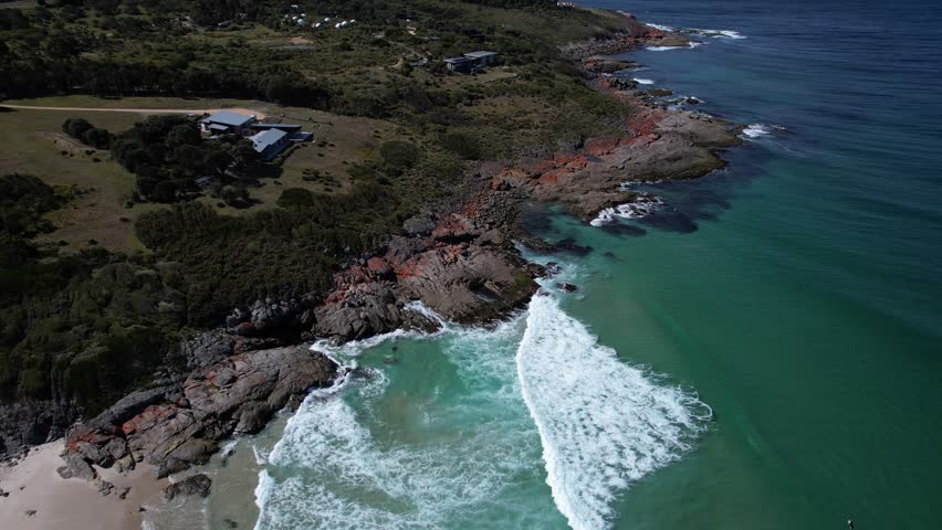 Little Beach Cove With Sea Waves Splashing On The Shore In Tasmania, Australia - Aerial Pullback
