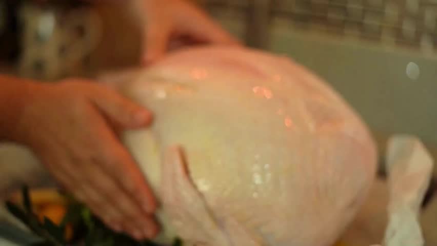 cooking chicken roasted stuffed turkey in kitchen family dinner thanksgiving and christmas holiday