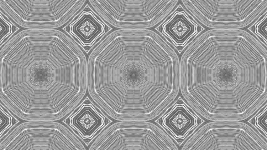 Monochrome circular geometric pattern with repeating structured rings and soft shading.