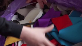 Pieces of fabric in a large bag. Production waste. colorful patchwork, recycling, save environment, old fabric, zero waste - Powered by Shutterstock - Get 15% off with code: PIKWIZARD15