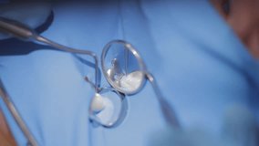 Dental procedure tooth filling close-up with tools for repair. - Powered by Shutterstock - Get 15% off with code: PIKWIZARD15