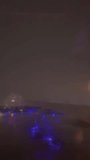 View from an airplane window on the runway during a rainy night. Selective focus. - Powered by Shutterstock - Get 15% off with code: PIKWIZARD15