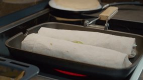 Lavash kebab is cooking on a grill pan, filling the kitchen with savory aromas. Perfect for a quick meal or gathering with friends and family. - Powered by Shutterstock - Get 15% off with code: PIKWIZARD15