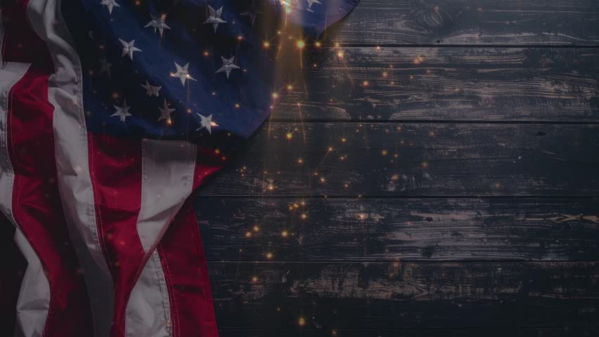 An animated video featuring the American flag on a dark wooden background with sparkling lights and the message 'Thanks you VETERANS' appearing. Perfect for patriotic holidays and tributes. - Powered by Shutterstock - Get 15% off with code: PIKWIZARD15