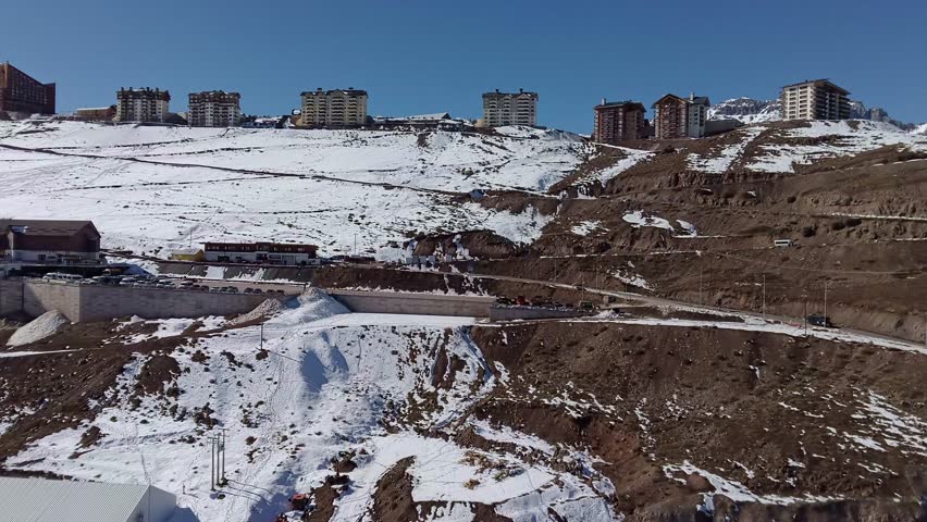 Aerial view of snowy Andes Mountains at Santiago Chile.	