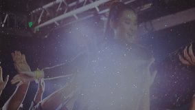 Female performer concert crowd-surfing, fans lifting her, rising and singing into mic to stage. Woman, venue, silhouette, backlighting, confetti, crowd, energy - Powered by Shutterstock - Get 15% off with code: PIKWIZARD15