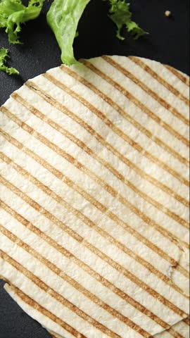 Lavash grill flatbreads tortilla ready to eat tasty snack fresh gourmet food background on table rustic food top view copy space