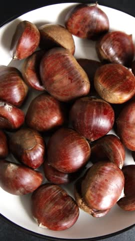 Chestnuts edible fruit treat tasty snack fresh gourmet food background on table rustic food top view copy space