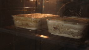 pie baking in transparent containers inside hot oven with golden batter rising under warm light showing homemade cooking process and cozy kitchen atmosphere concept of food preparation - Powered by Shutterstock - Get 15% off with code: PIKWIZARD15