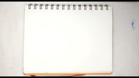 The artist makes a stroke with blue watercolor paint. The drawing process. - Powered by Shutterstock - Get 15% off with code: PIKWIZARD15