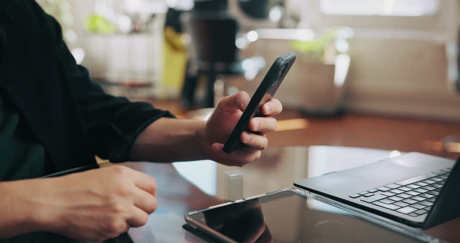 Phone, hands and typing with business man in office for communication, project feedback and research. Online report, networking platform and proposal timeline with person in agency for email