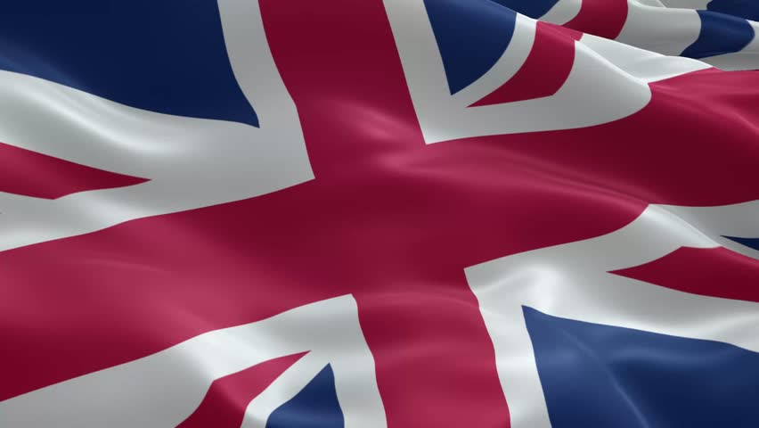 Waving Union Jack flag gracefully flutters in the wind, embodying British pride and national identity, a symbol of unity and tradition