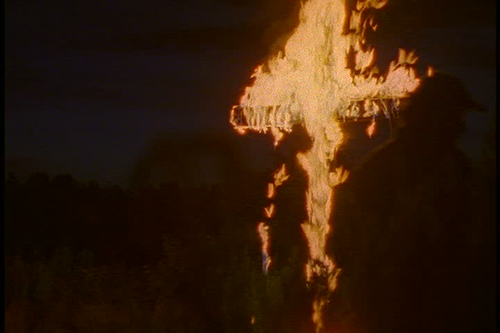 Cross burning on hill. MS cross burning at night. Flaming cross with yellow flames.  | Shutterstock HD Video #3948986