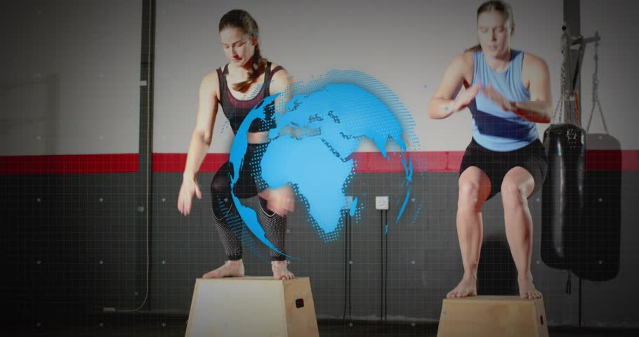 Two women doing plyo box jumps and squats in gym, trainer entering, globe overlay guiding fitness. Duo, circuit, plyometrics, cardio, dynamic, futuristic, coaching