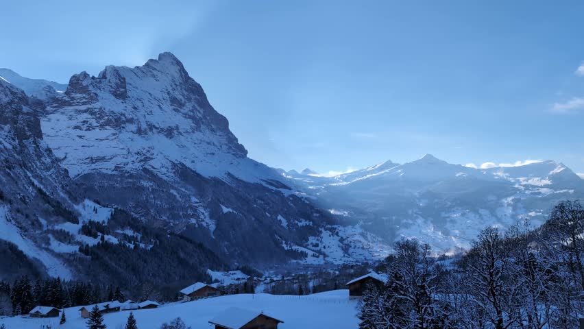 Alpine mountain valley in the winter, Grindelwald Switzerland with Eiger mountain