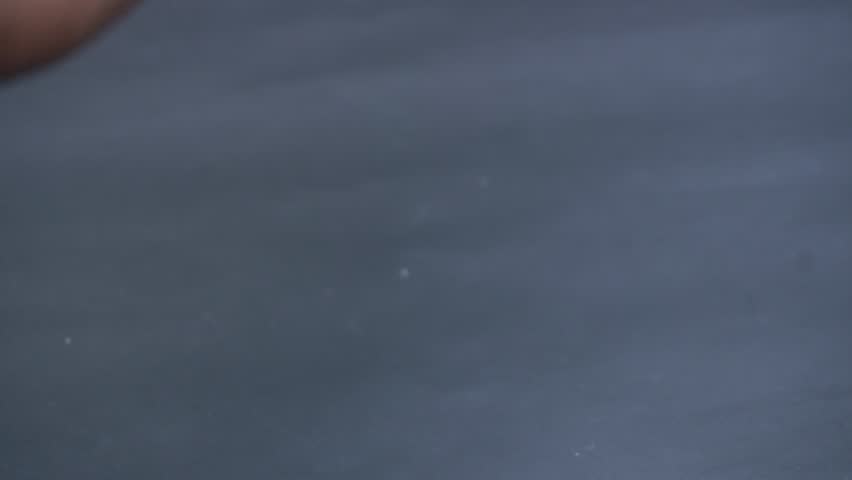 Colorful sour rainbow belts candy with vibrant sugar coating, offering tangy flavor, chewy texture, and eye-catching striped design for fun treats