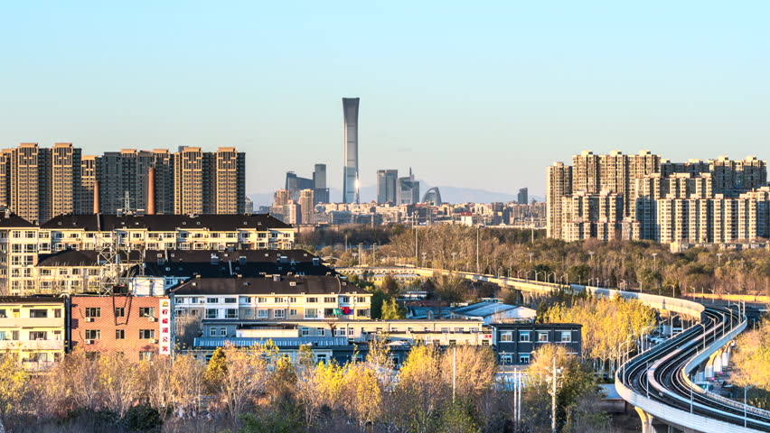 Time-lapse footage of Beijing, China’s subway and light rail passing through commercial and residential districts from day to night