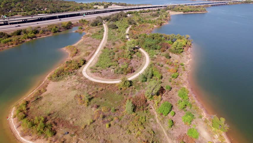 Aerial footage of the Copperas Branch Park walking trail on Lake Lewisville in Texas.