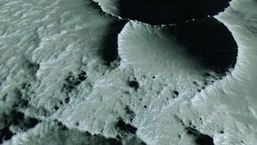 A stunning 3D animation establishing shot, flying low over the cratered, gray surface of the Moon with the blackness of space and distant Earth in view. - Powered by Shutterstock - Get 15% off with code: PIKWIZARD15