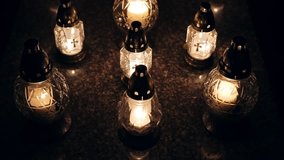 Votive Candle Lanterns on Surface of Limestone Grave Tombstone at All Saint Day Evening - Powered by Shutterstock - Get 15% off with code: PIKWIZARD15