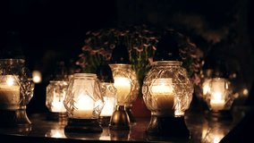 Votive Candle Lanterns on Surface of Limestone Grave Tombstone at All Saint Day Evening - Powered by Shutterstock - Get 15% off with code: PIKWIZARD15