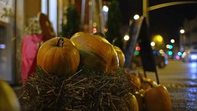 Autumnal October Halloween Outdoor Decoration made of Pumpkin and Hay Bale - Powered by Shutterstock - Get 15% off with code: PIKWIZARD15