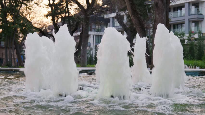 City Fountain Jets Spraying Water in an Urban Decorative Pool