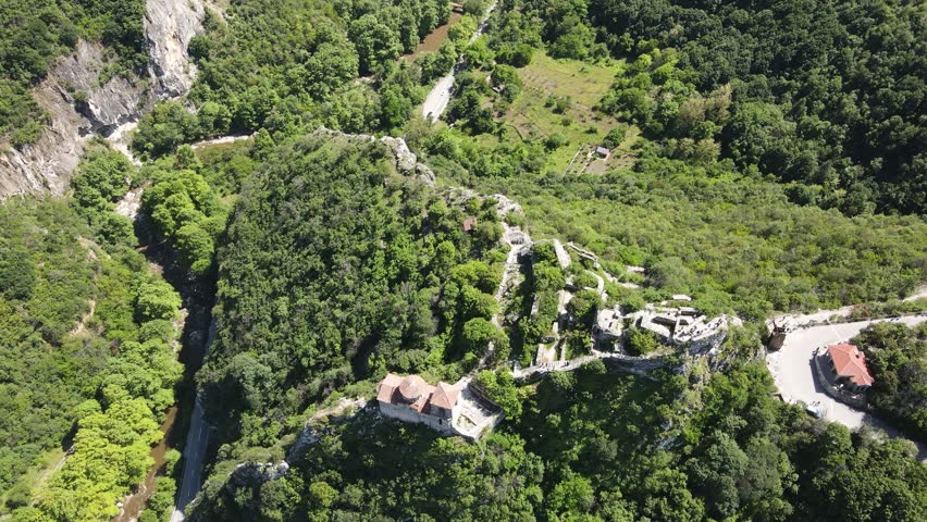 Aerial Spring view of Church of the Holy Mother of God at ruins of Medieval Asen Fortress, Asenovgrad, Plovdiv Region, Bulgaria