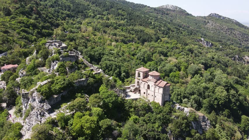 Aerial Spring view of Church of the Holy Mother of God at ruins of Medieval Asen Fortress, Asenovgrad, Plovdiv Region, Bulgaria