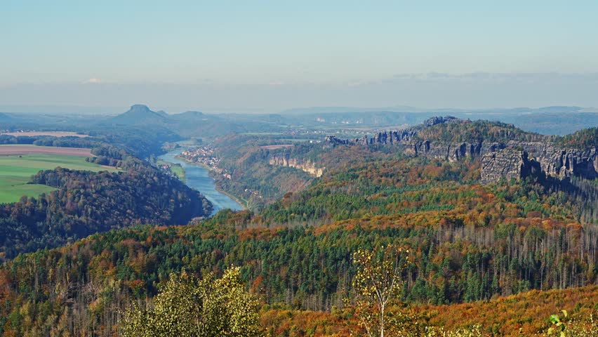 Amazing views of Saxon Switzerland National Park in Germany, featuring dramatic rock formations and the Elbe River in breathtaking natural landscape.