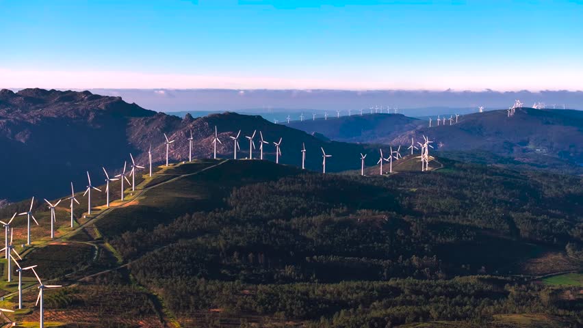 Wind Turbines Over Mountains In Parque eólico Adraño, A Coruña, Spain. Aerial Drone Shot