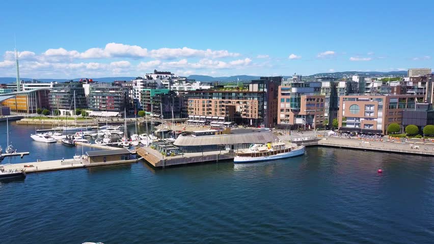 Oslo harbor at the Aker Brygge and Tjuvholmen neighbourhood aerial view in Oslo. Oslo is the capital of Norway.