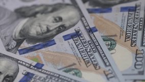 Macro Rotating US 100 Dollar Bills Cash, American Currency Close-up, USA 100 Dollar Notes Concept - Powered by Shutterstock - Get 15% off with code: PIKWIZARD15