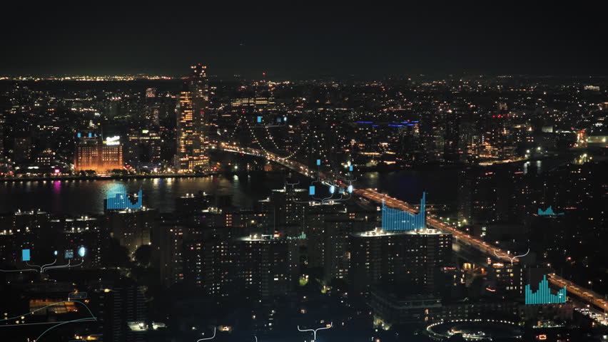 Aerial view of a city at night with futuristic digital overlay. Glowing lines and charts represent data flow and communication - Powered by Shutterstock - Get 15% off with code: PIKWIZARD15