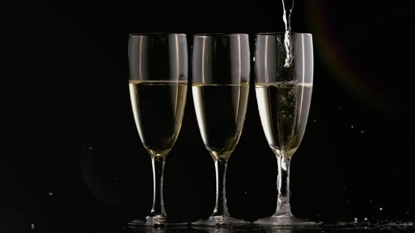Pouring stream from above shifting over 3 flutes making bubbles, creating foamy heads, flare moving. Stemware, champagne, sparkling, reflections, minimalist, studio, elegance - Powered by Shutterstock - Get 15% off with code: PIKWIZARD15