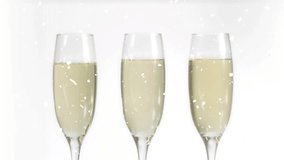 Center champagne flute receiving strawberry drop, sending tall splash outward to showcase beverage. Stemware, droplets, bubbles, sparkle, highkey, minimalist, studio - Powered by Shutterstock - Get 15% off with code: PIKWIZARD15