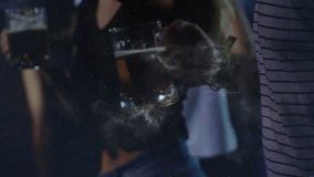 Camera pulling back woman adjusting hair holding beer for nightlife, nebula sweeping faces. Bar, pub, crowd, glass, galaxy, lensflare, blonde - Powered by Shutterstock - Get 15% off with code: PIKWIZARD15