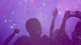 Fans raising phones as music starts, filming stage, purple haze and particles swirling over phones. Silhouettes, audience, smartphones, concert, fog, violet, lighting - Powered by Shutterstock - Get 15% off with code: PIKWIZARD15
