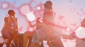 Five friends sitting on truck bed at shoreline, woman raising hand starting pink bokeh for travel. Group, vehicle, beach, sunset, backlight, lensflare, overlay - Powered by Shutterstock - Get 15% off with code: PIKWIZARD15