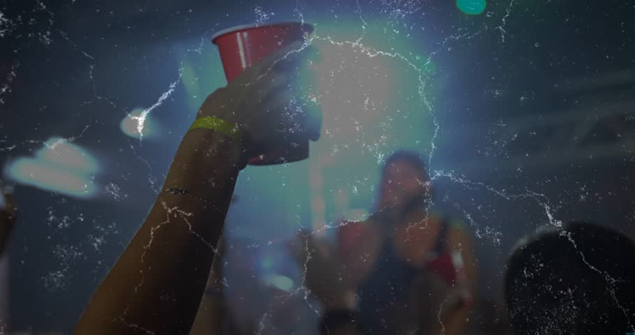 Singer raising cup, main arm lifting red cup, crowd-cheers under pulsing LED lights, film grain. Concert, stage, haze, grain, vintage, neon, motion