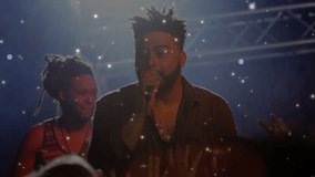 Lead vocalist raising mic and singing in music club, particles drifting across frame engaging crowd. Singer, stage, live, performance, microphone, lighting, haze - Powered by Shutterstock - Get 15% off with code: PIKWIZARD15