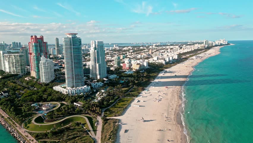 Skyscraper architecture in Miami. Miami south beach aerial sunset. Skyscraper at south pointe park. Luxury hotel skyscraper. Aerial Miami beach. Luxury aerial landscape. South pointe. Summer vacation