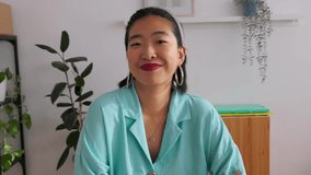 Close up POV asian woman listening colleague on laptop video call working from the office. Young entrepreneur female talking with partner through online meeting. Business people concept - Powered by Shutterstock - Get 15% off with code: PIKWIZARD15