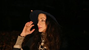 Elegant bright makeup smiling woman in blue retro hat sitting on the bench in vintage fashion dress outdoor autumn, empty copy space. Closeup face head portrait. Red lipstick, long brown hair - Powered by Shutterstock - Get 15% off with code: PIKWIZARD15